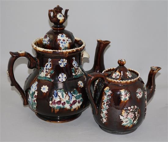 Two Meescham pottery teapots and covers, 32.5cm and 20cm